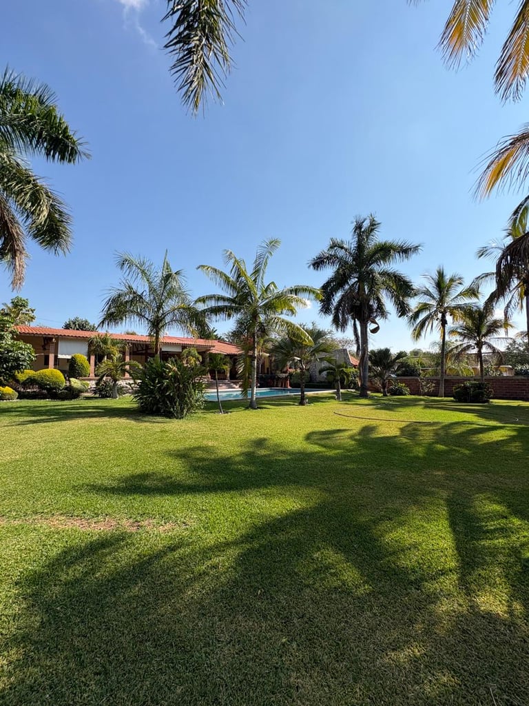 Spacious tropical property with lush green lawn